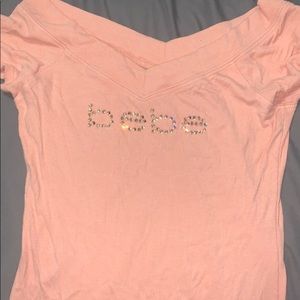 pinkish bebe shirt!